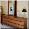 F43. Robinson Furniture Mid Century Modern triple dresser with mirror. 31”h x 72”w x 18”d Mirror 55”h x 31”w 